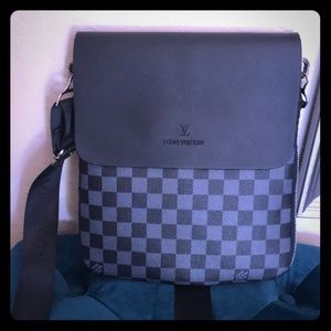 A small unisex satchel.